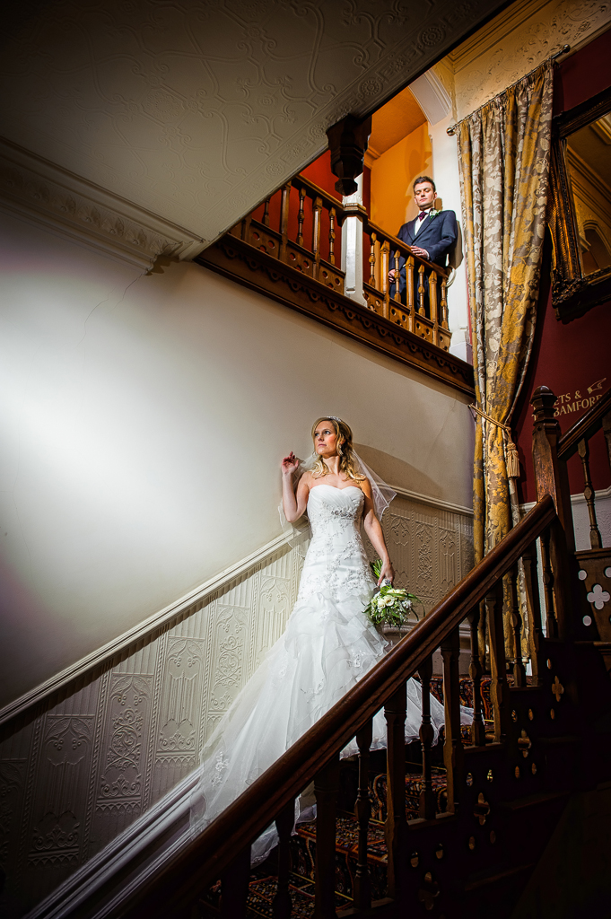 bride and groom on stairs
