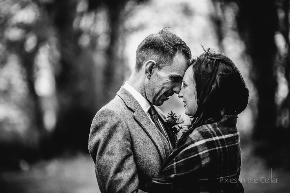 winter bride tartan shawl groom in tweed