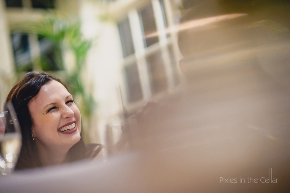 bride laughing at speeches