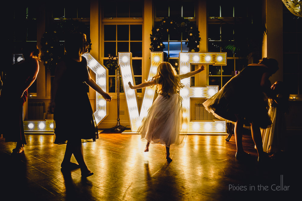 flower girl and love sign