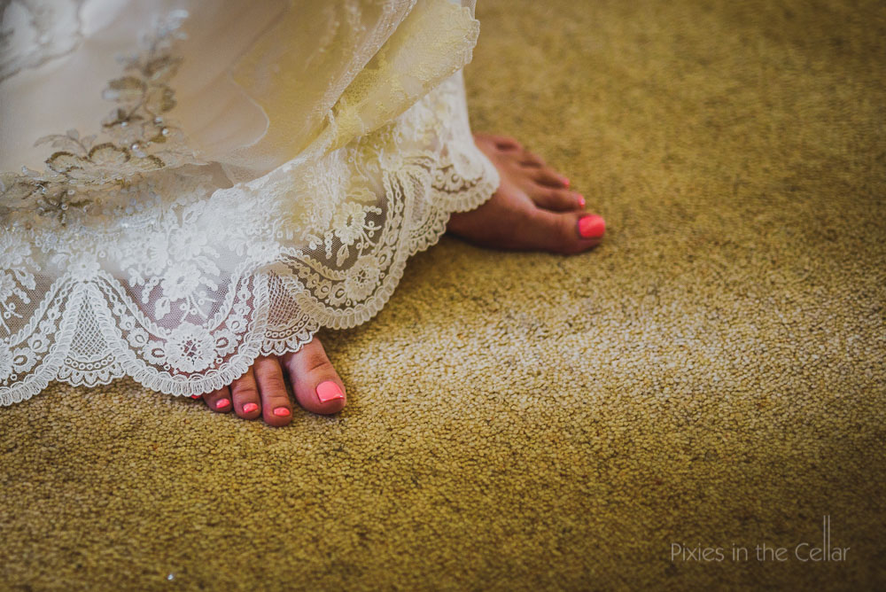 lace wedding dress and toes