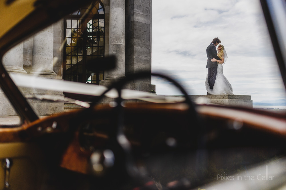 bride groom and wedding car