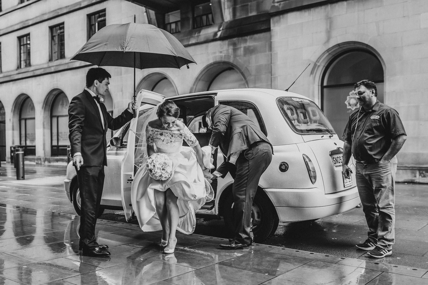 Rainy wet wedding Manchester City centre