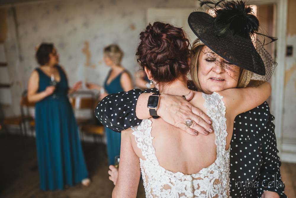 bride and mum hug Manchester