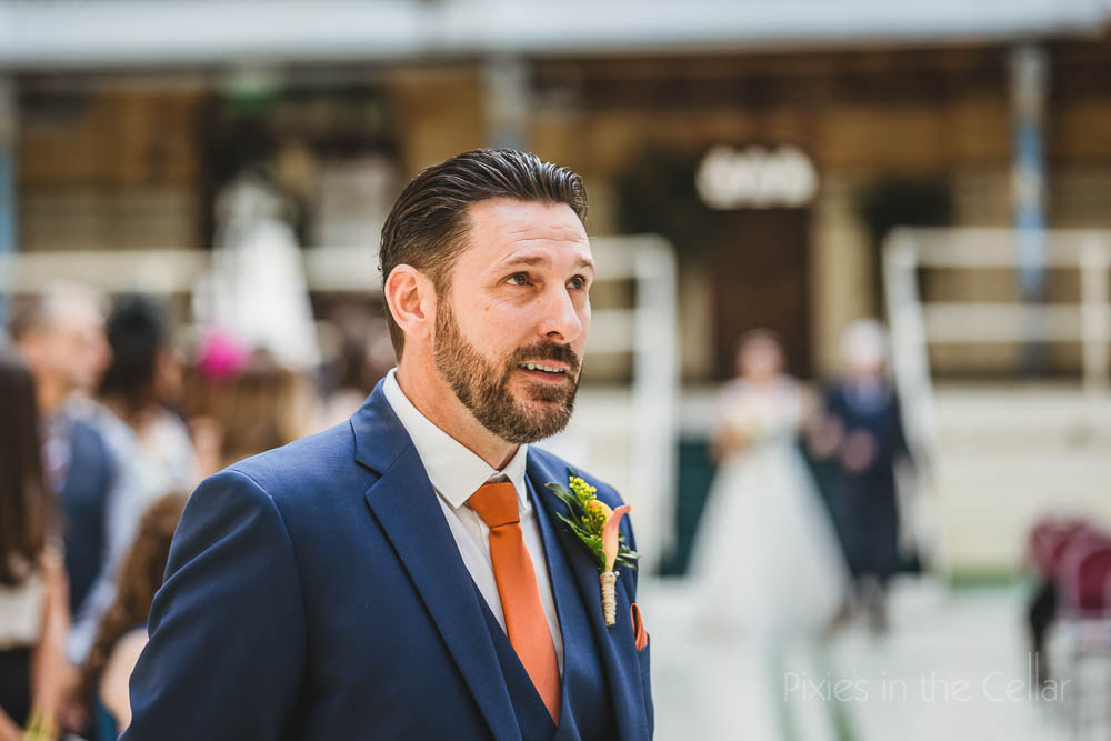 groom orange tie
